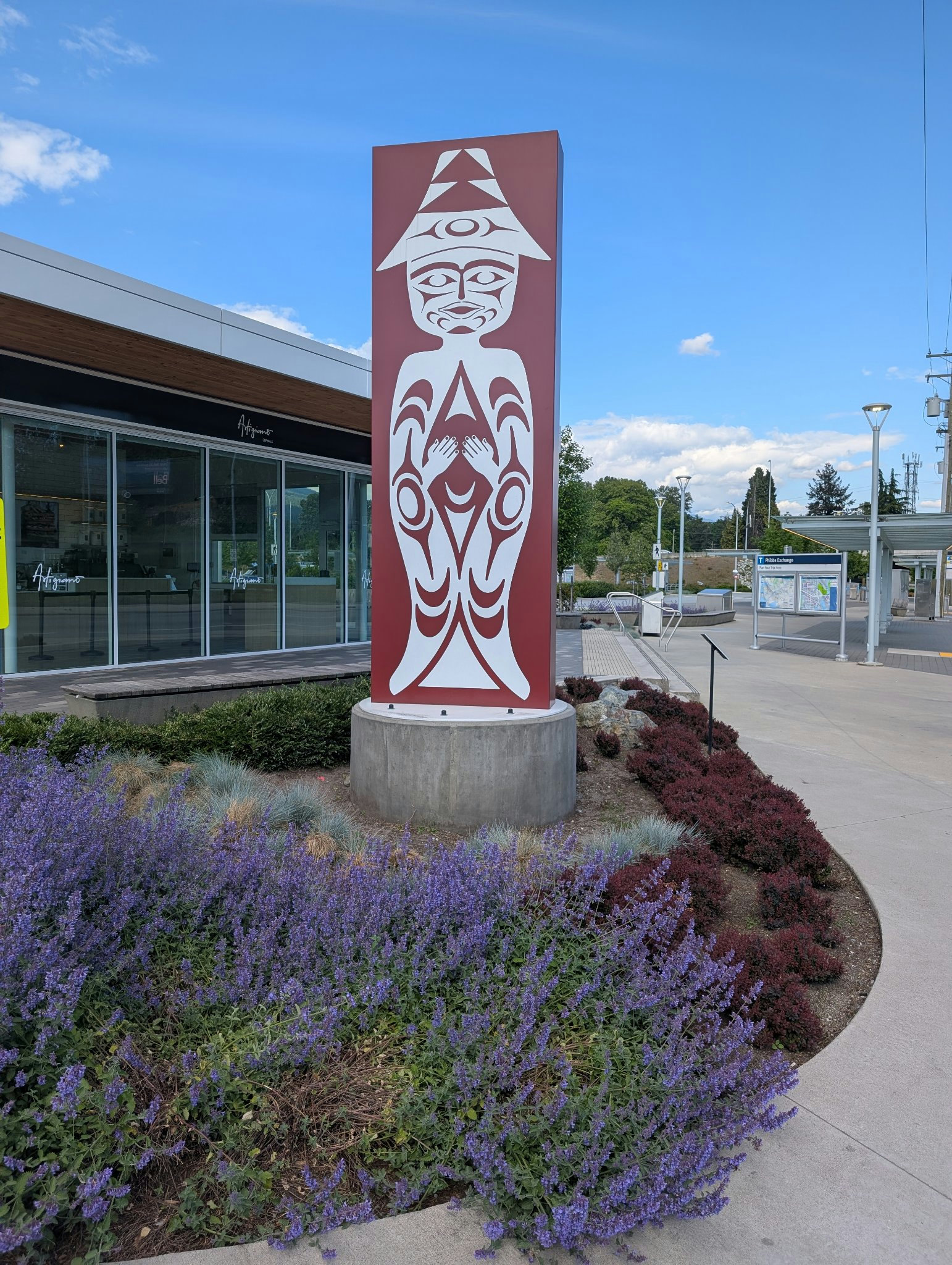 Red guy in District of North Vancouver, photographed May 18, 2026